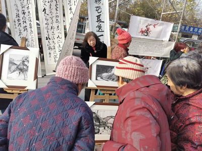 府河新居社区“丹青会友翰墨飘香”迎新书画展活动